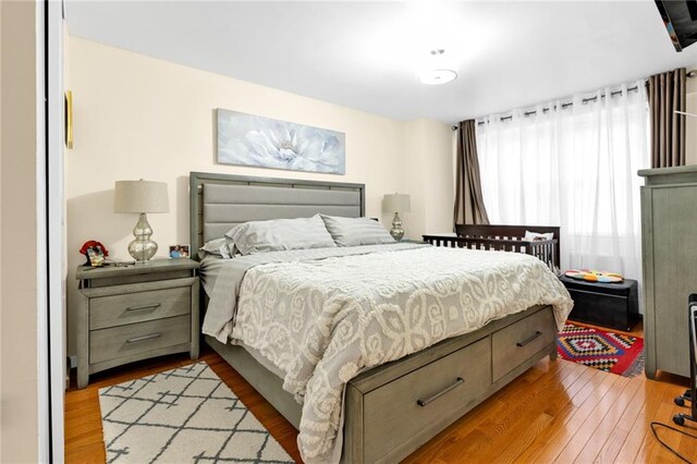 bedroom featuring light wood-type flooring