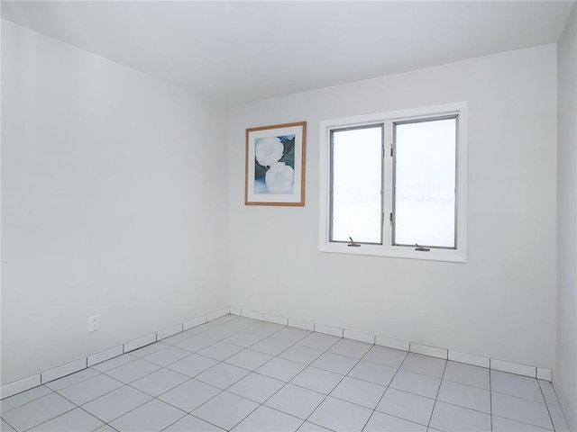 view of tiled spare room