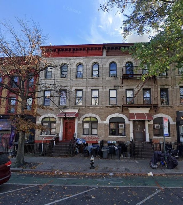 view of building exterior with entry steps