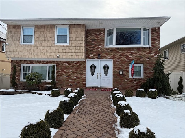 view of front of property with brick siding