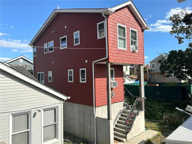 view of home's exterior featuring cooling unit