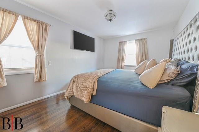 bedroom featuring dark wood-type flooring