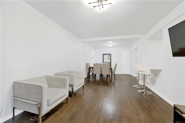 living area with dark wood-type flooring