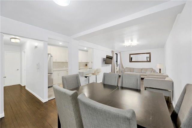 dining room with dark hardwood / wood-style floors