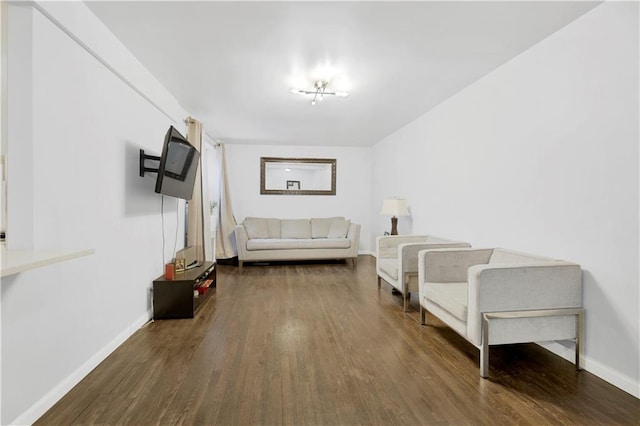 living area with dark wood-type flooring