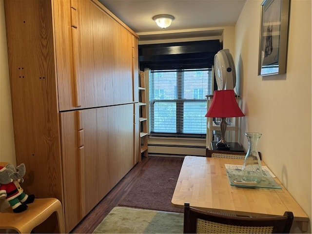 kitchen with dark wood-style flooring and a baseboard radiator