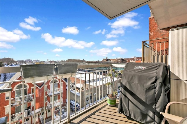 balcony featuring area for grilling