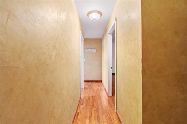 hallway featuring light hardwood / wood-style floors