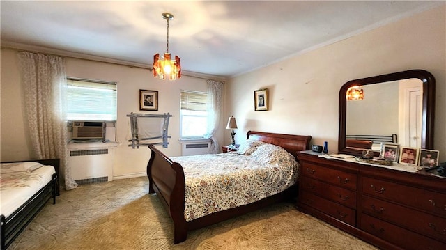 bedroom with cooling unit, light colored carpet, baseboards, ornamental molding, and radiator heating unit