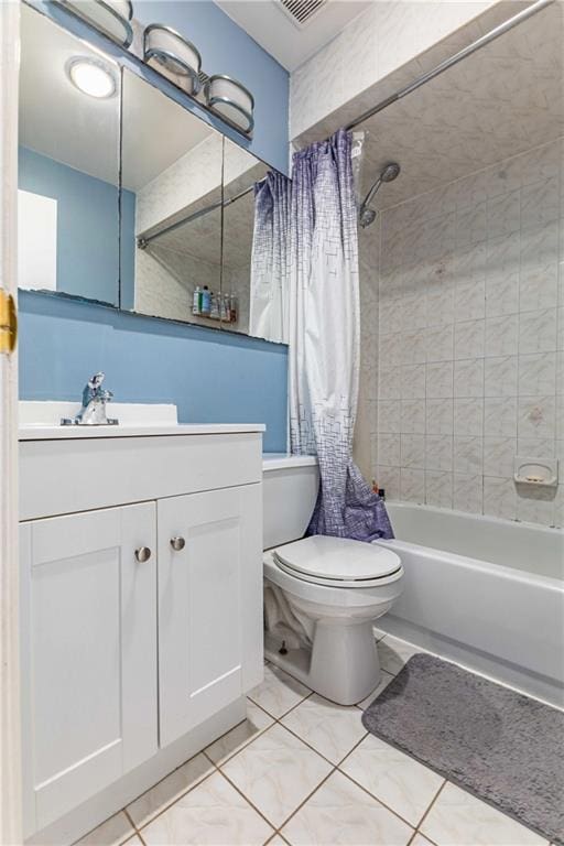 full bathroom featuring vanity, toilet, and shower / bath combo with shower curtain