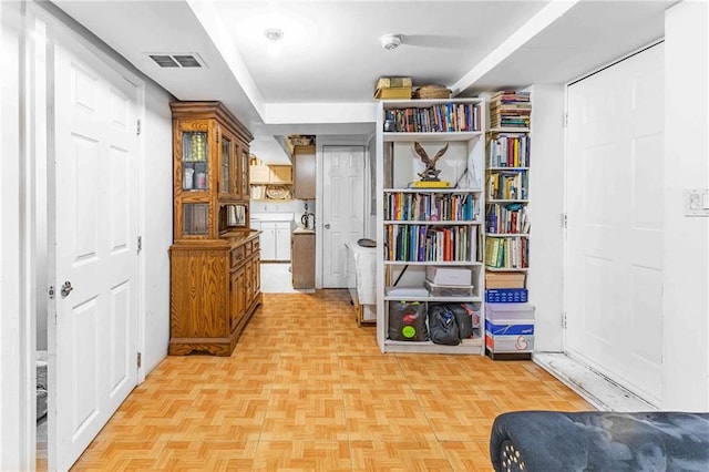 hallway with light parquet flooring