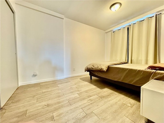 bedroom featuring light hardwood / wood-style floors