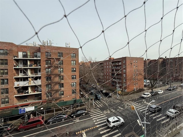 view of property featuring parking