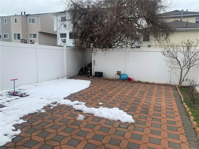 view of snow covered patio