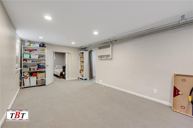 basement with carpet floors, baseboards, and recessed lighting