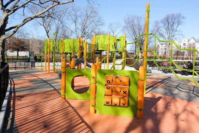 community play area featuring fence