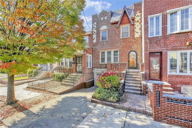 view of property with brick siding