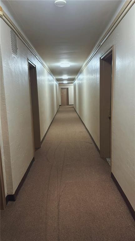 corridor with light carpet