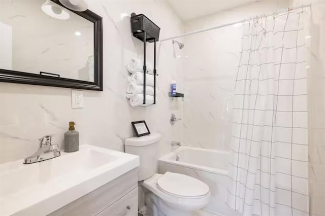 full bathroom featuring vanity, toilet, and shower / bathtub combination with curtain