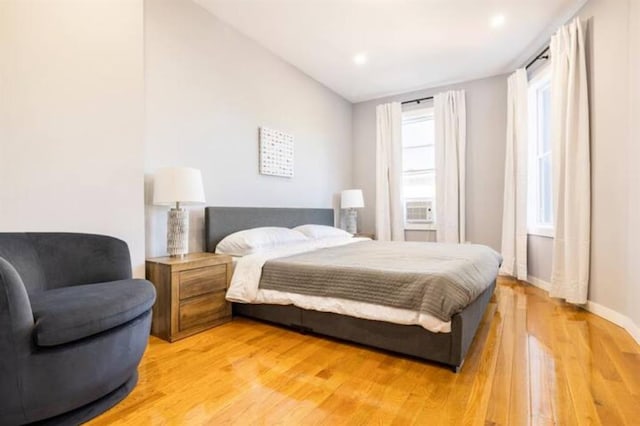 bedroom featuring light hardwood / wood-style floors