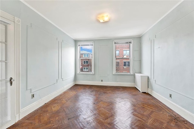 552 17th St, Brooklyn, NY 11215 - empty room featuring crown molding and baseboards