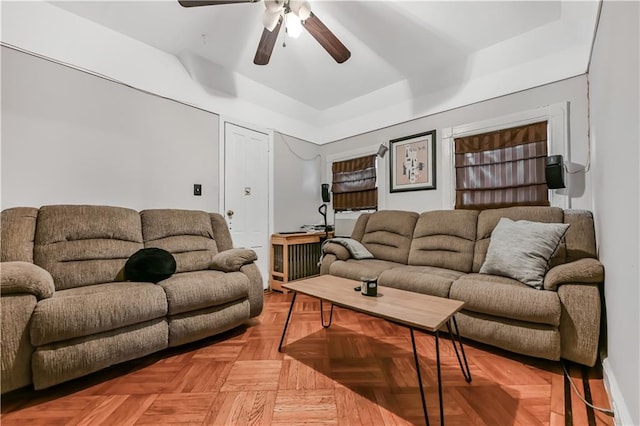 515 E 24th St, Brooklyn, NY 11210 - living room featuring ceiling fan and a raised ceiling