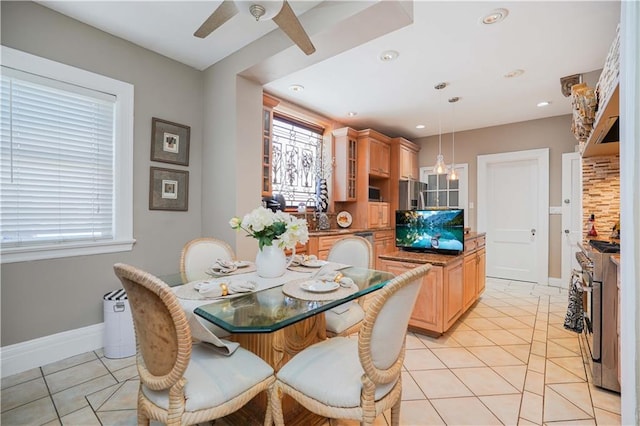 dining room with light tile patterned floors, baseboards, recessed lighting, and a ceiling fan