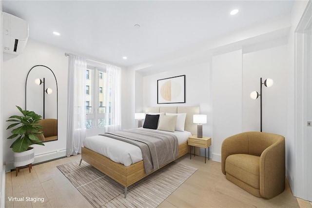 bedroom with light wood-type flooring, recessed lighting, a wall mounted AC, and a baseboard radiator