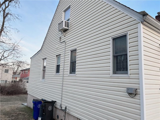 view of side of property featuring cooling unit