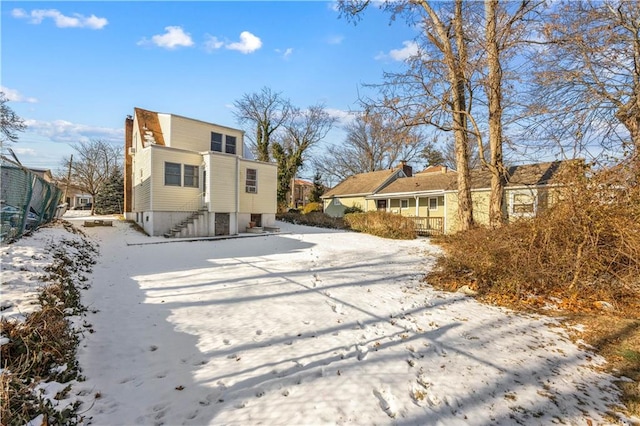 view of snow covered property