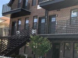 view of home's exterior with brick siding