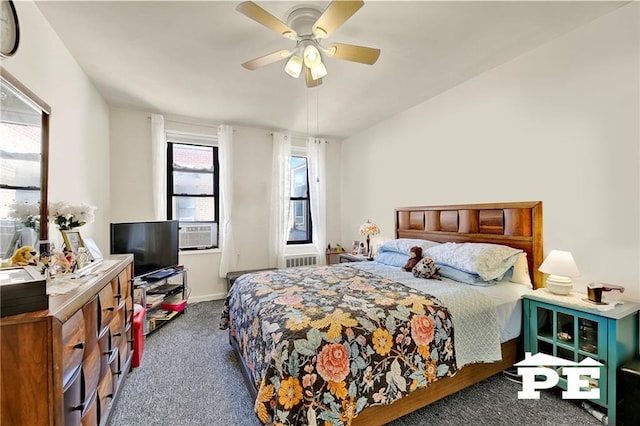 bedroom featuring dark colored carpet, cooling unit, and a ceiling fan