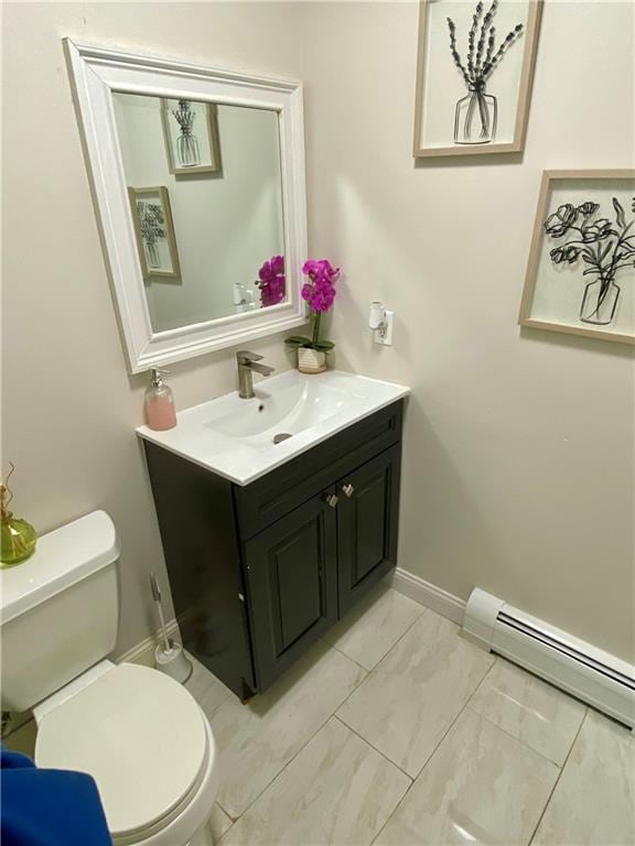 43 Lerer Ln, Staten Island, NY 10307 - bathroom featuring vanity, baseboard heating, and marble finish floors