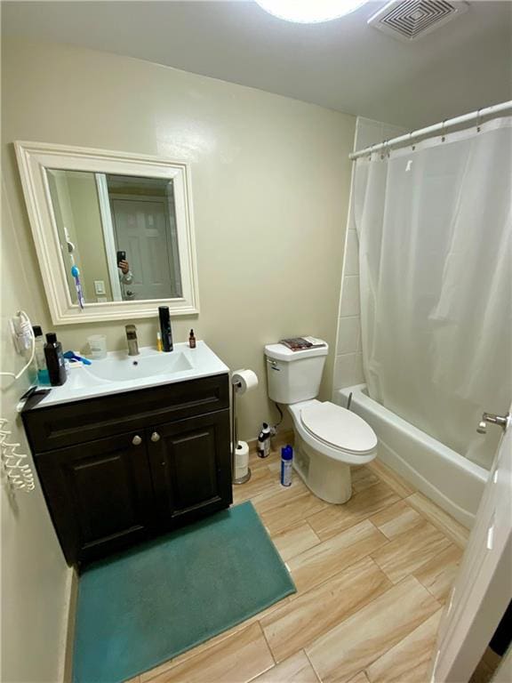 43 Lerer Ln, Staten Island, NY 10307 - full bath featuring vanity, shower / tub combo with curtain, and wood finished floors