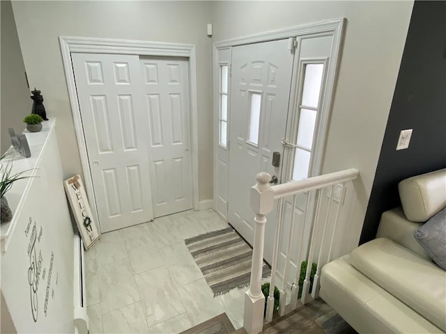 foyer with marble finish floor