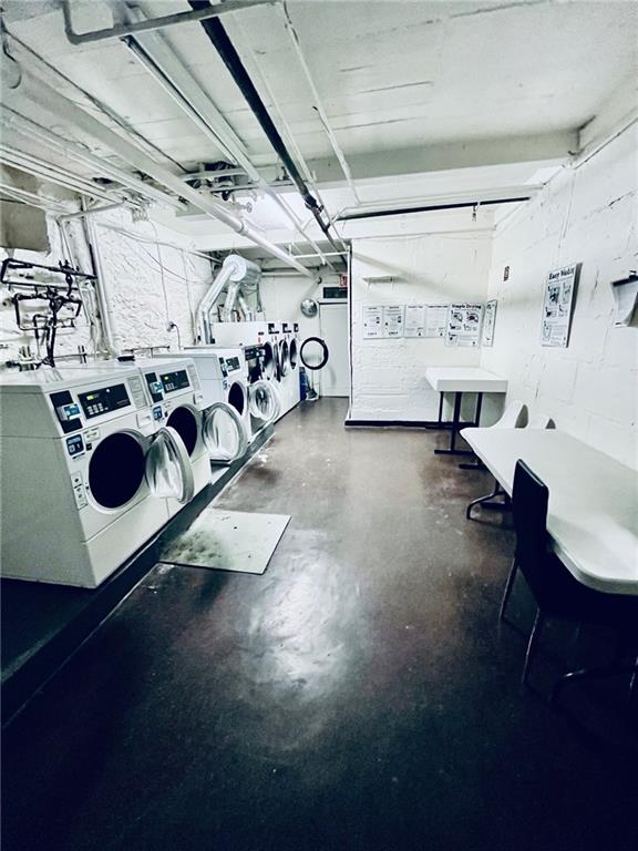 laundry room with washer and clothes dryer