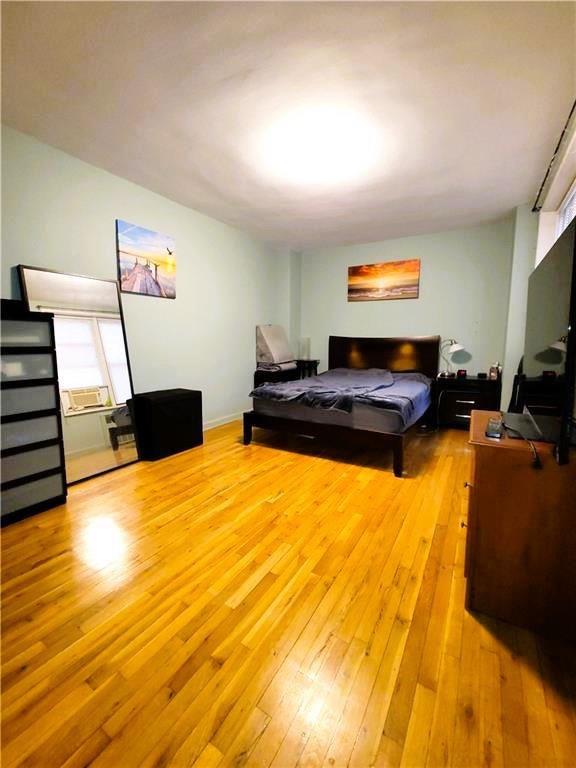 bedroom featuring light hardwood / wood-style floors