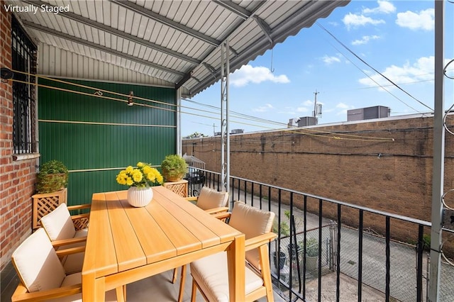 balcony featuring outdoor dining space