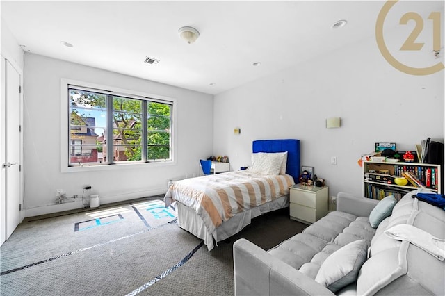 bedroom featuring carpet and visible vents