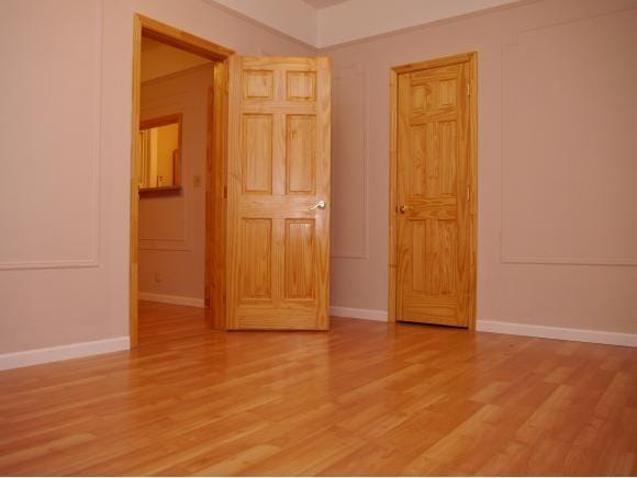 unfurnished bedroom featuring light hardwood / wood-style flooring