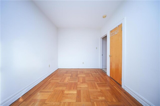 corridor featuring light parquet floors