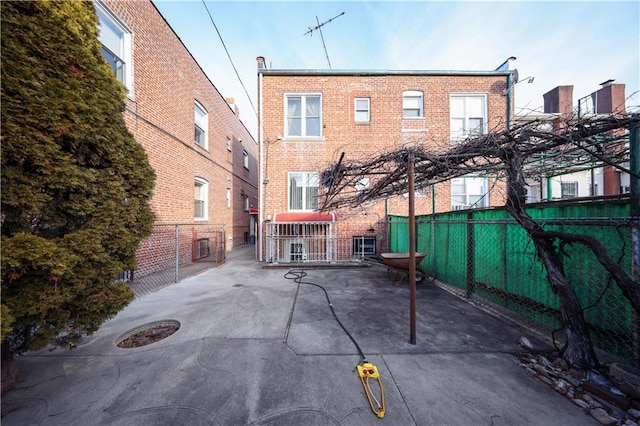 view of patio / terrace featuring fence