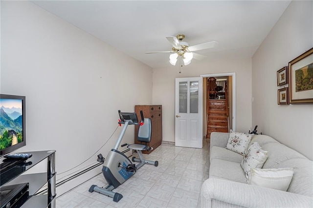 exercise room featuring ceiling fan