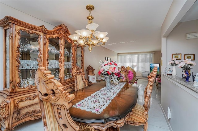 50 Bay 46th St, Brooklyn, NY 11214 - dining room featuring a chandelier and tile patterned flooring