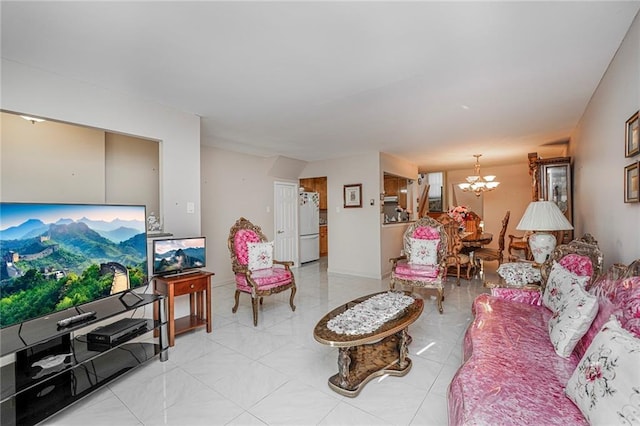 living area with a notable chandelier