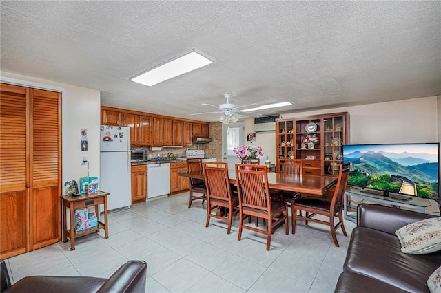 50 Bay 46th St, Brooklyn, NY 11214 - dining room with ceiling fan, a textured ceiling, light tile patterned floors, and a skylight