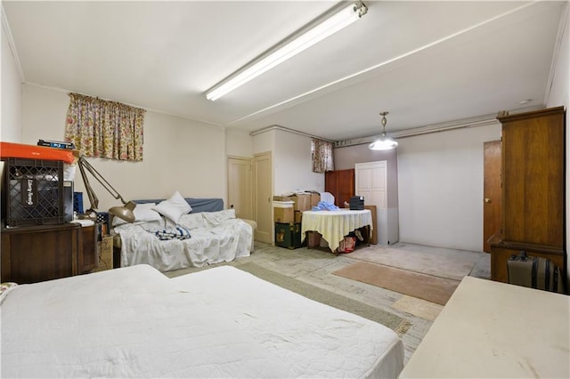 bedroom with light colored carpet