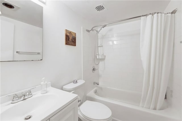 bathroom with toilet, visible vents, shower / tub combo with curtain, and vanity