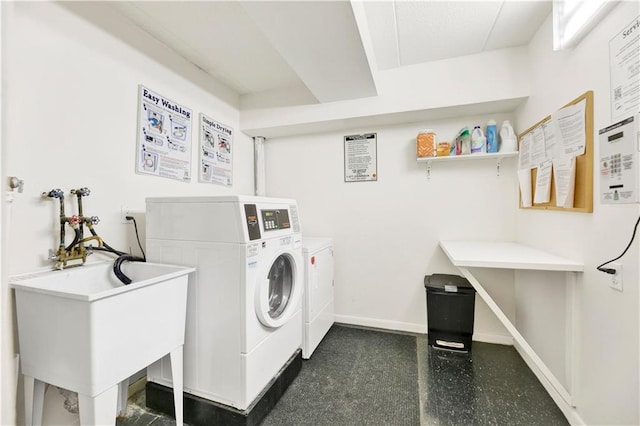 10108 4th Ave Unit 25A, Brooklyn, NY 11209 - community laundry room featuring washing machine and dryer and baseboards