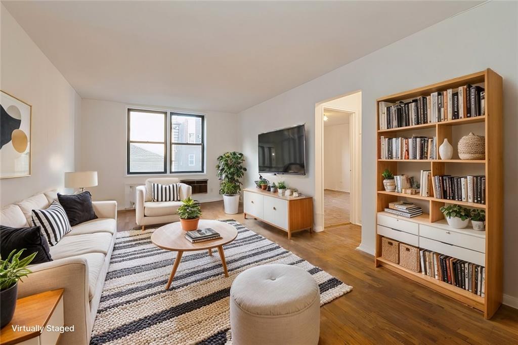 living room featuring dark hardwood / wood-style flooring